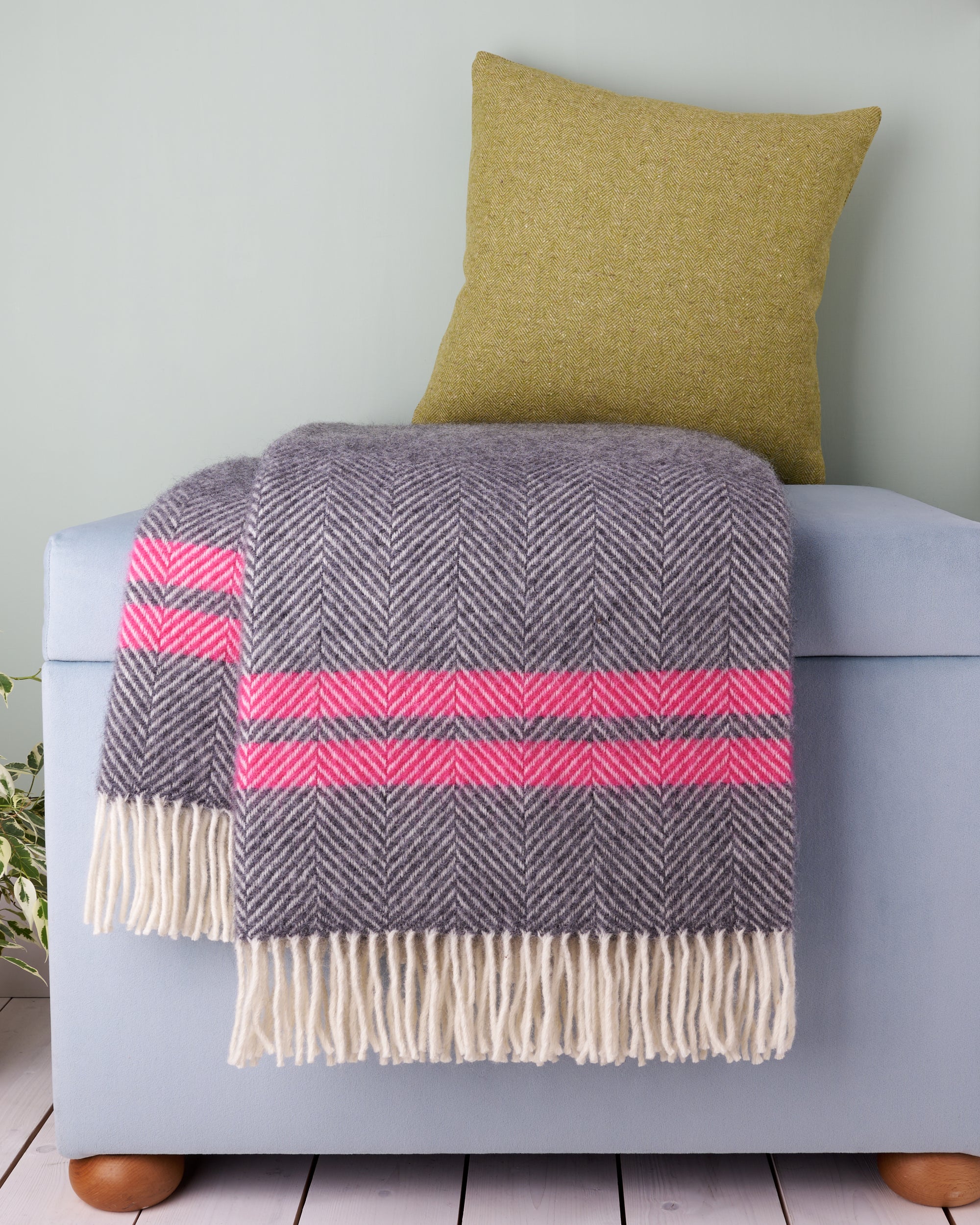 https://www.cushyhomeandstyle.co.uk/cdn/shop/products/tweedmill-2-stripe-slate-pink-fishbone-herringbone-wool-blanket-throw-cushy-home-and-style-copyright.jpg?v=1678206917&width=2000